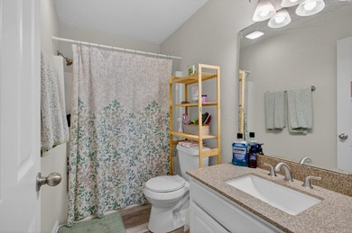 Beautifully updated second-floor condominium located on the - photo 15