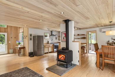 This bright, contemporary home, newly built in 2022, puts you - photo 12