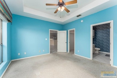 Waterfront home with an open and functional floor plan, screened - photo 16