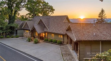 Experience elegant mountain living in this warm and inviting - photo 2