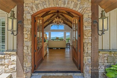 Experience elegant mountain living in this warm and inviting - photo 10