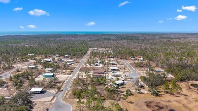 KEATON BEACH LOVERS! Welcome to this 0.69-acre lot in the gated - photo 12