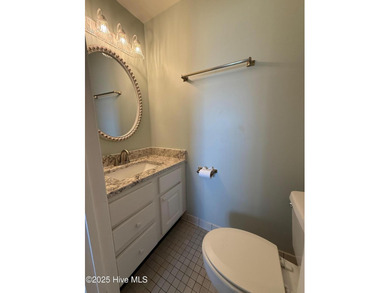 Step into relaxed coastal living with this freshly updated and