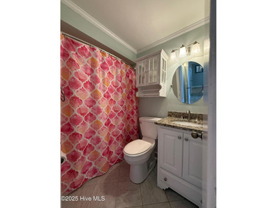 Step into relaxed coastal living with this freshly updated and