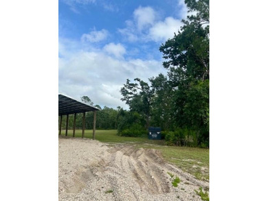 KEATON BEACH LOVERS! Welcome to this 0.69-acre lot in the gated - photo 27