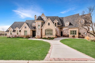 Located in the prestigious gated Citadel community, this - photo 1