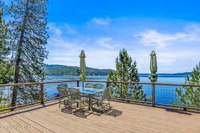 Located in Carlin Bay, this custom lakefront home offers 6,074 - photo 3