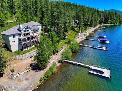 Located in Carlin Bay, this custom lakefront home offers 6,074 - photo 6
