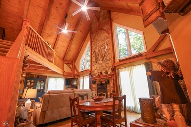 Custom red oak timber-frame home with Lake Monroe views, located - photo 3