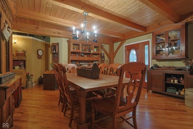 Custom red oak timber-frame home with Lake Monroe views, located - photo 5