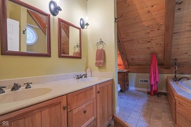 Custom red oak timber-frame home with Lake Monroe views, located - photo 8