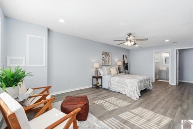 Looking for a lake house getaway? This newly renovated home has - photo 13