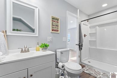 Looking for a lake house getaway? This newly renovated home has - photo 18