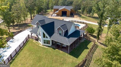 Welcome to a rare, turn-key equestrian estate offering a fully - photo 33