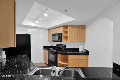 Discover refined desert living in this beautifully updated