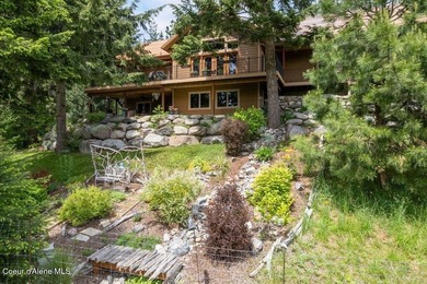 Custom-built home on 13.59 private, treed acres in the highly - photo 2