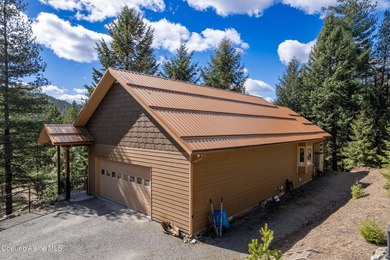 Custom-built home on 13.59 private, treed acres in the highly - photo 10