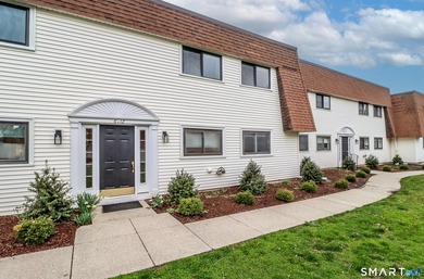 This first-floor, 2BR, 2-bath unit is in a quiet Southport - photo 1