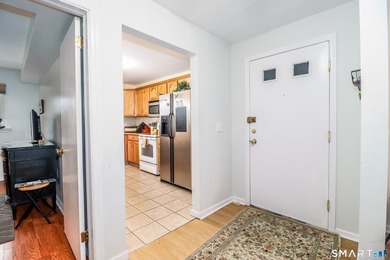 This first-floor, 2BR, 2-bath unit is in a quiet Southport - photo 3