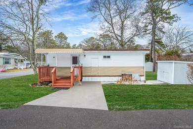 Charming 2-Bedroom Mobile Home in River Woods Welcome to this - photo 1