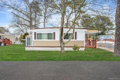Charming 2-Bedroom Mobile Home in River Woods Welcome to this - photo 3