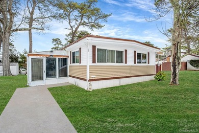 Charming 2-Bedroom Mobile Home in River Woods Welcome to this - photo 4