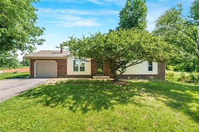 Mature trees, solid surface flooring throughout, wood-burning - photo 1