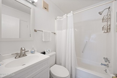Nicely maintained 2-bedroom, 2-bath Tennis Villa located on the - photo 22