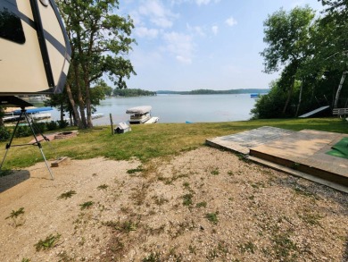 This lake lot has .355 acres with 91 feet of shoreline and a - photo 4