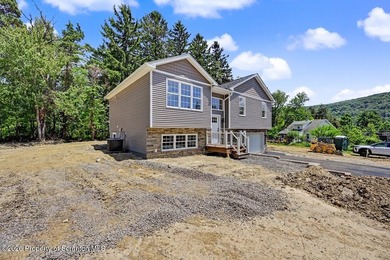 Welcome to this stunning new construction bi-level in Scott - photo 5
