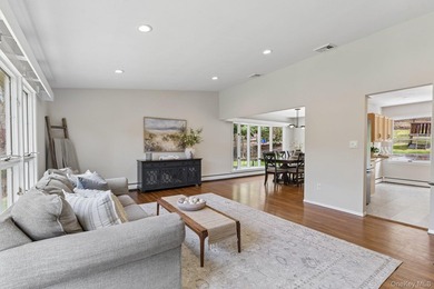 Set on a full acre and surrounded by mature trees and lush - photo 9