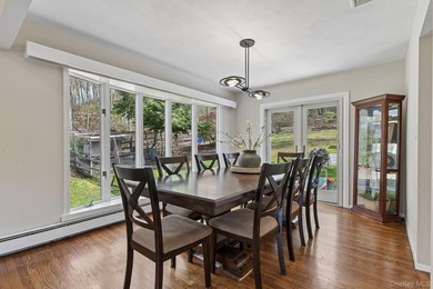 Set on a full acre and surrounded by mature trees and lush - photo 10