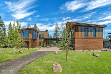 Set against a serene stand of forest, this spacious residence - photo 1