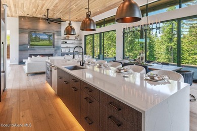 Set against a serene stand of forest, this spacious residence - photo 5