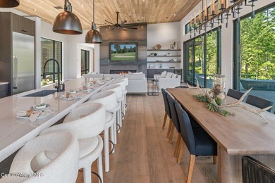Set against a serene stand of forest, this spacious residence - photo 9