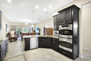 Beach, lake, and woods-this charming home has it all. Located - photo 10