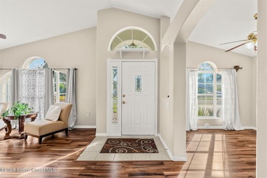 Discover serene lakeside living in this inviting 4-bedroom - photo 3