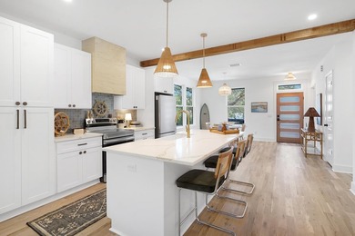 Step into this brand-new bungalow-style beach house, centrally - photo 8