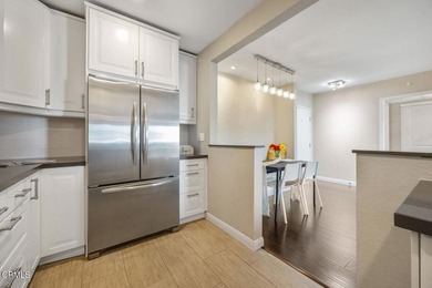 Welcome home to this 1-story top floor end unit that has been