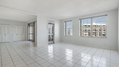 Experience beachfront living at its best in this all-ages condo