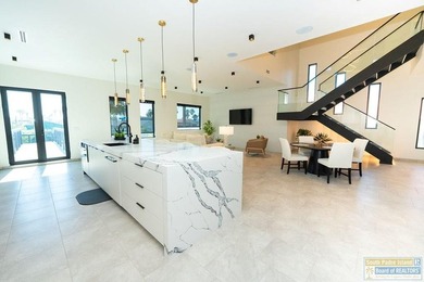 Come view this exquisite channel-front coastal home. With its - photo 27