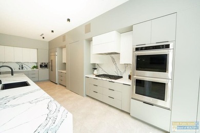 Come view this exquisite channel-front coastal home. With its - photo 33