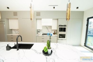 Come view this exquisite channel-front coastal home. With its - photo 34