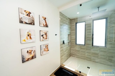 Come view this exquisite channel-front coastal home. With its - photo 43