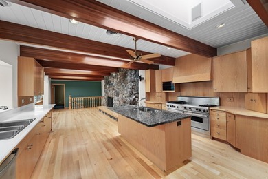 Tucked away behind a private tree-lined drive in one of - photo 12