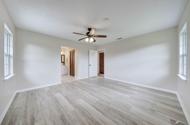 Welcome to 12302 Country Club Drive in the desirable Sandy Creek - photo 16