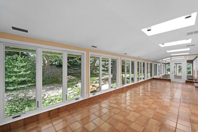 Tucked away behind a private tree-lined drive in one of - photo 18