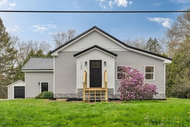 Fully renovated and move-in ready, this stylish yet cozy home - photo 1