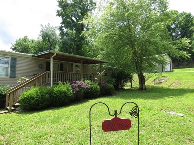 Step into a world of lakeside serenity with this stunning - photo 2