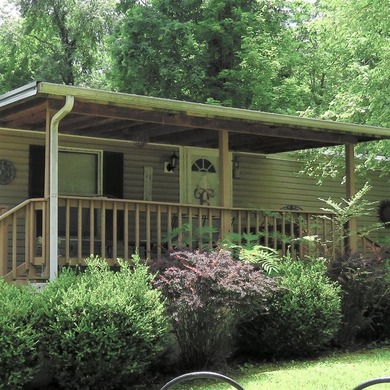 Step into a world of lakeside serenity with this stunning - photo 4